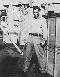 Phil Morris protecting the box photo (1957 Cruise Book)